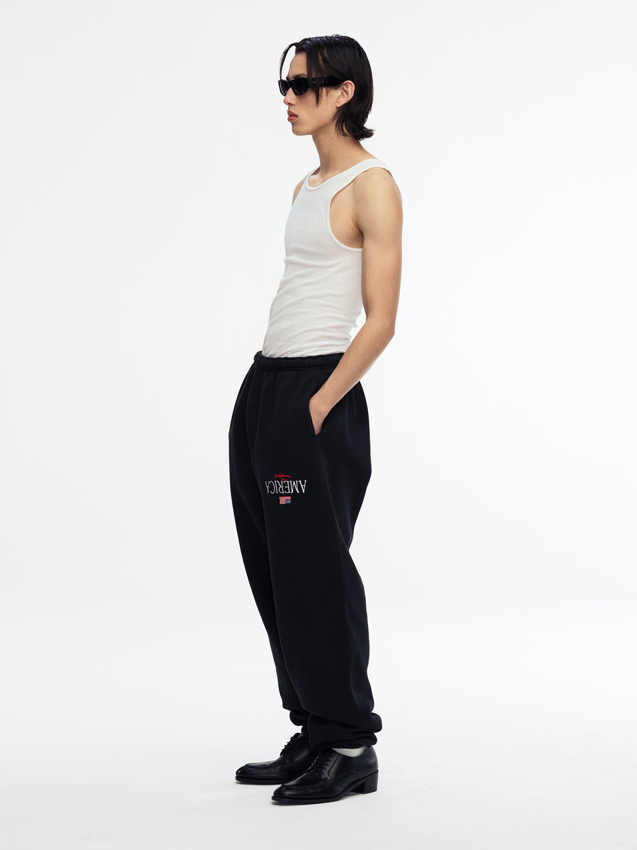 【WILLYCHAVARRIA】BIG WILLY SWEAT PANTコットンパンツ WELCOME TO AMERICA SWEATPANT - BLACK BEAUTY | Willy Chavarria