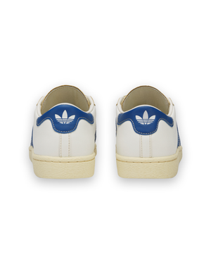 ADIDAS X WC JABBAR DRESS SNEAKER - WHITE/BLUE